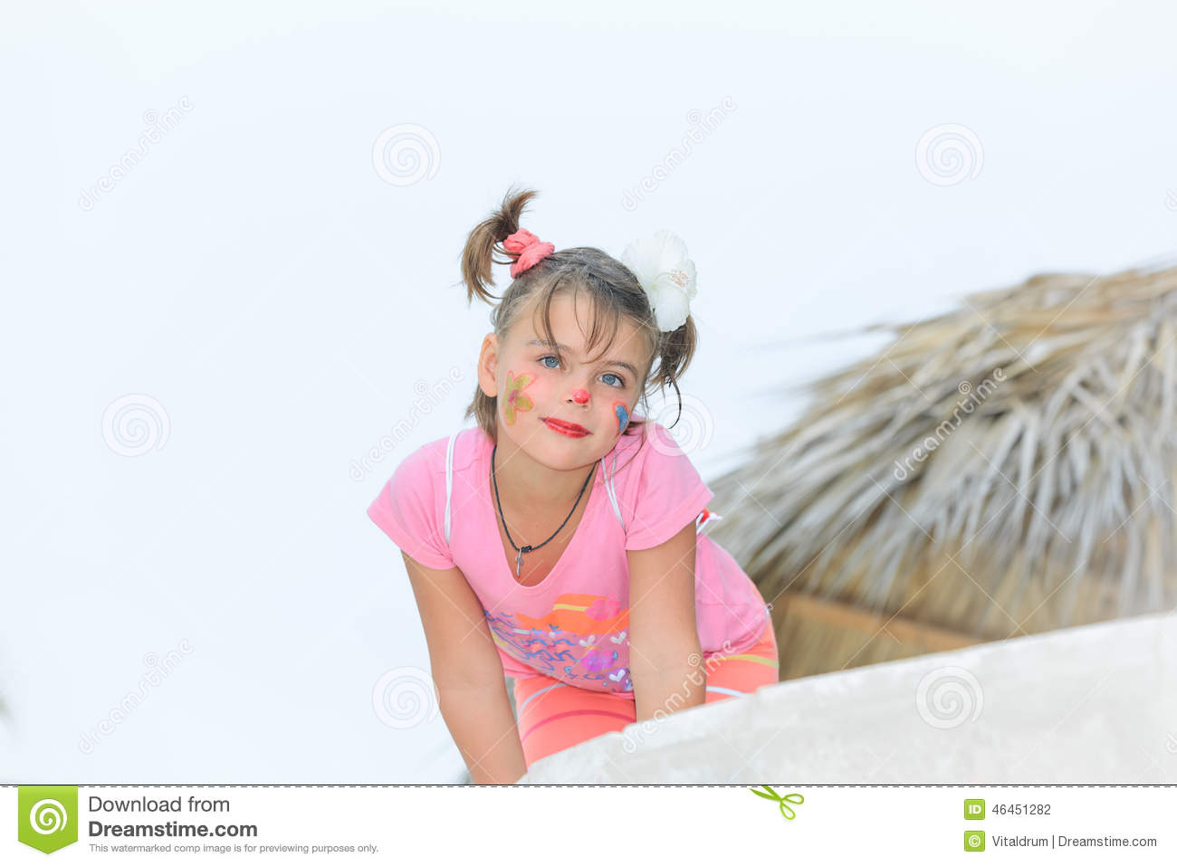 woman sitting on kids face
